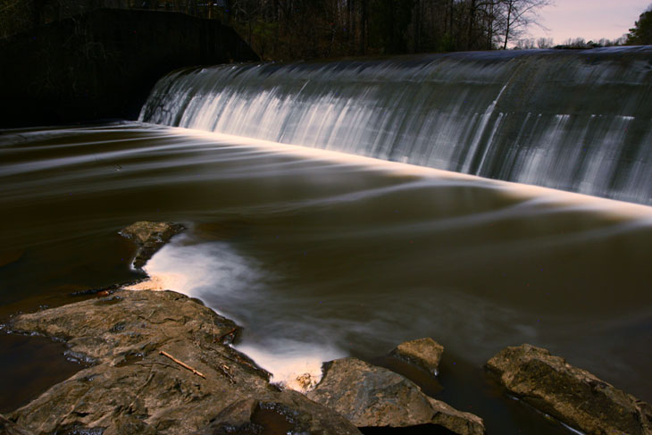 time exposure Eno River spillway in moonlight