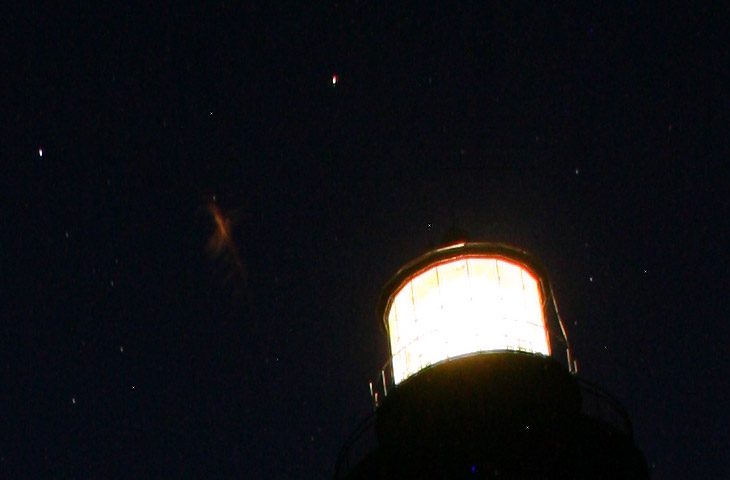 unidentified light in sky near electrical storm