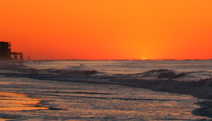 first appearance of sun over horizon at North Topsail Beach