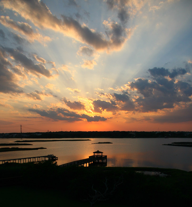 sunset over sound with gazebo