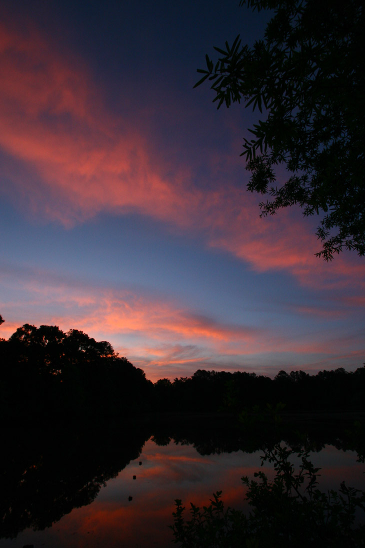 sunrise colors over pond