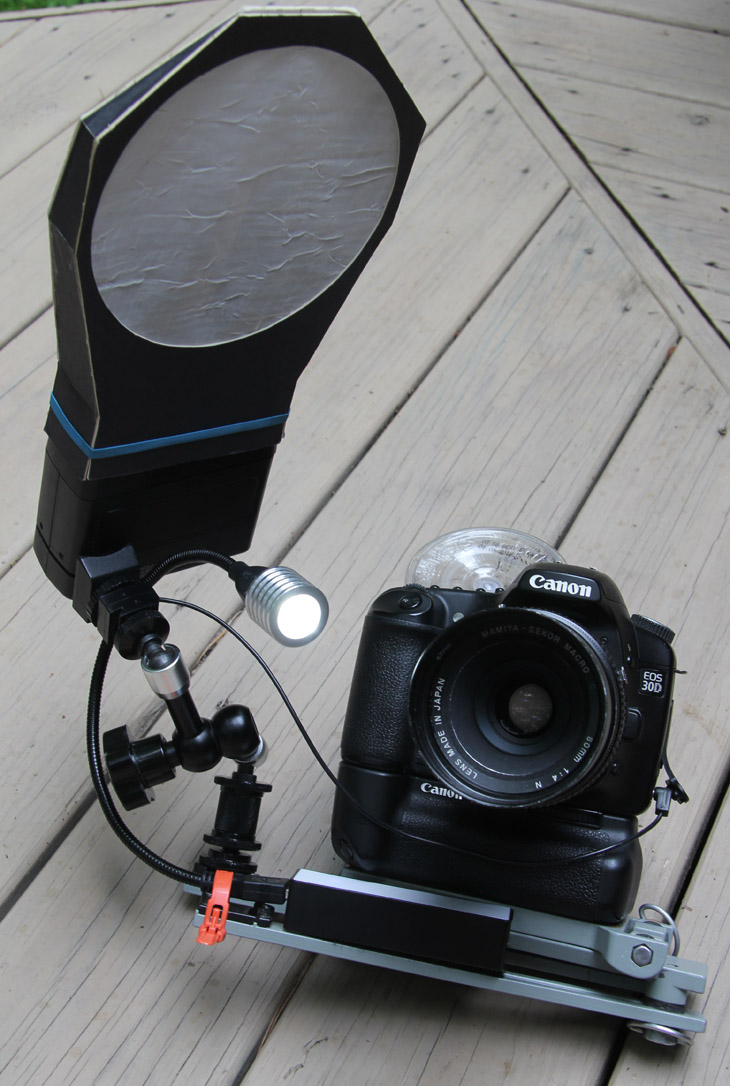 macro photography rig showing focusing light and softboxed flash unit
