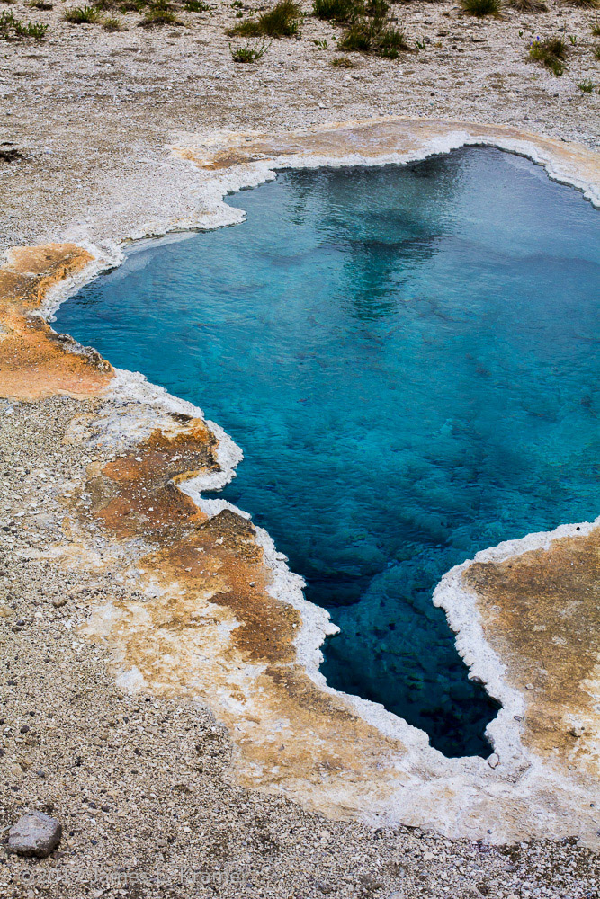 deep blue mineral pool in Yellowstone National Park by James L. Kramer