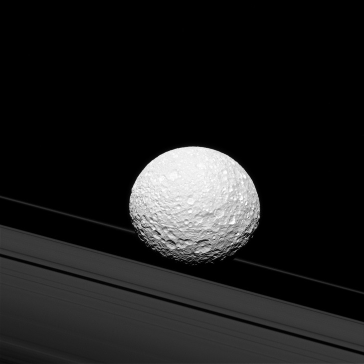 Saturn's moon MImas against the rings
