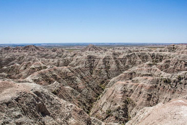 mazelike expanse of crevices, Badlands South Dakota by James L. Kramer