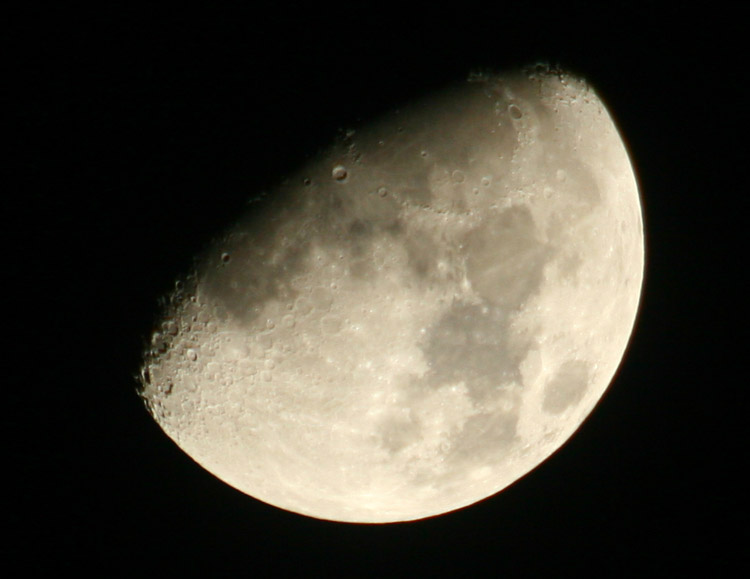 first quarter phase of moon showing sunrise has passed Tycho crater