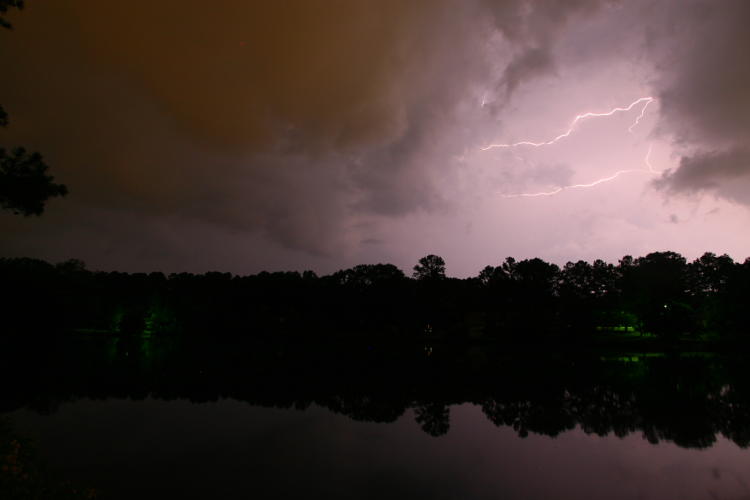 lightning bolts extending sideways across the sky