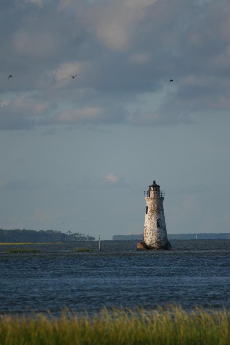 Cockspur lighthouse as seen near the causeway of Tybee Island, GA