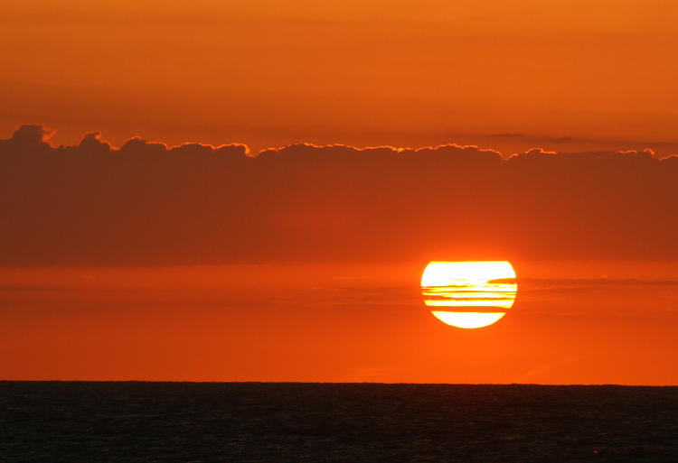 sunrise in cloud bands