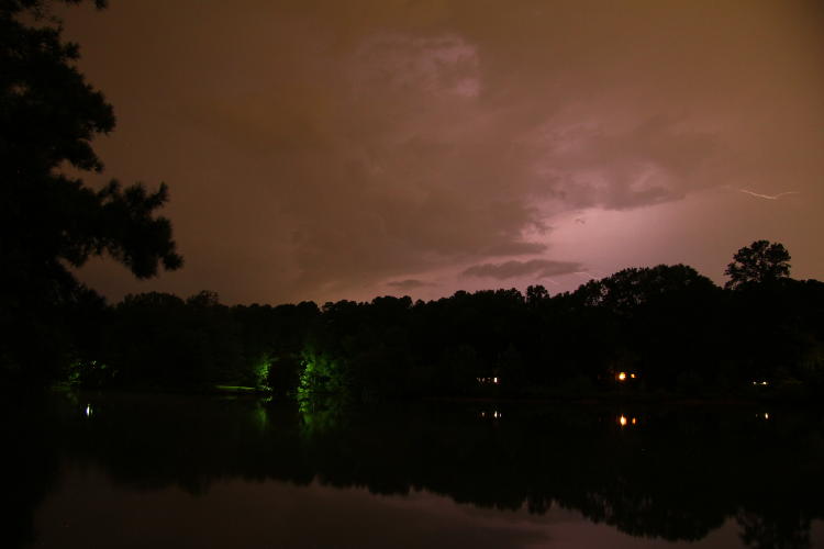 storm cloud with faint lightning tendrils