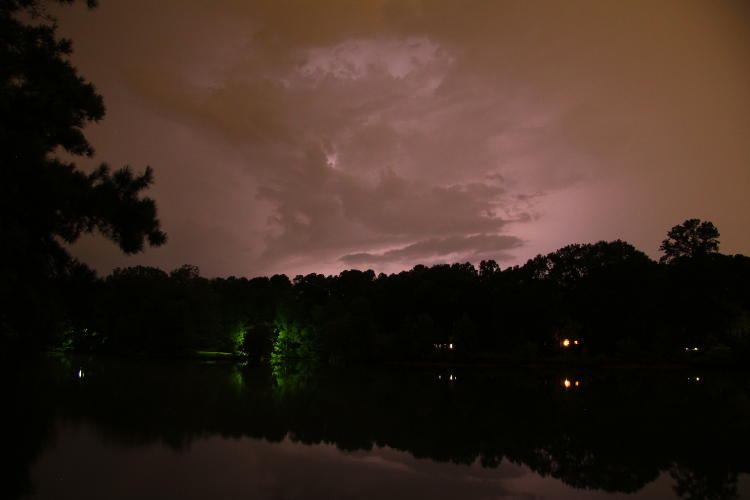 storm backlit by lightning