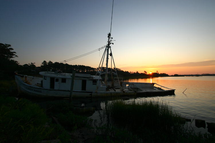 swamped fishing trawler at daybreak, Oak Island NC