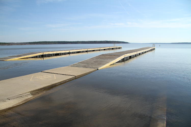 floating ramps on Jordan Lake almost submerged at fixed end