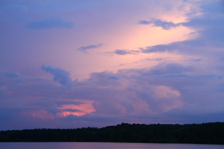 near-sunset colors on varied clouds