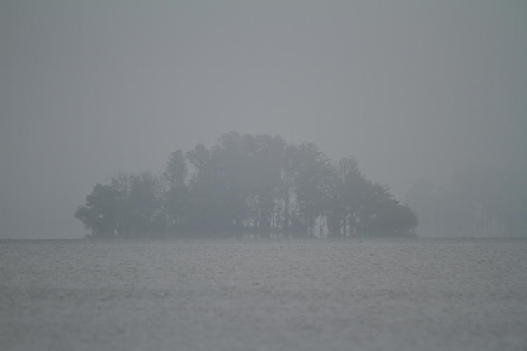 distant island seen through fog on Jordan Lake