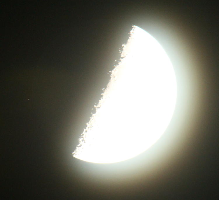 badly over-exposed moon with star about to be eclipsed