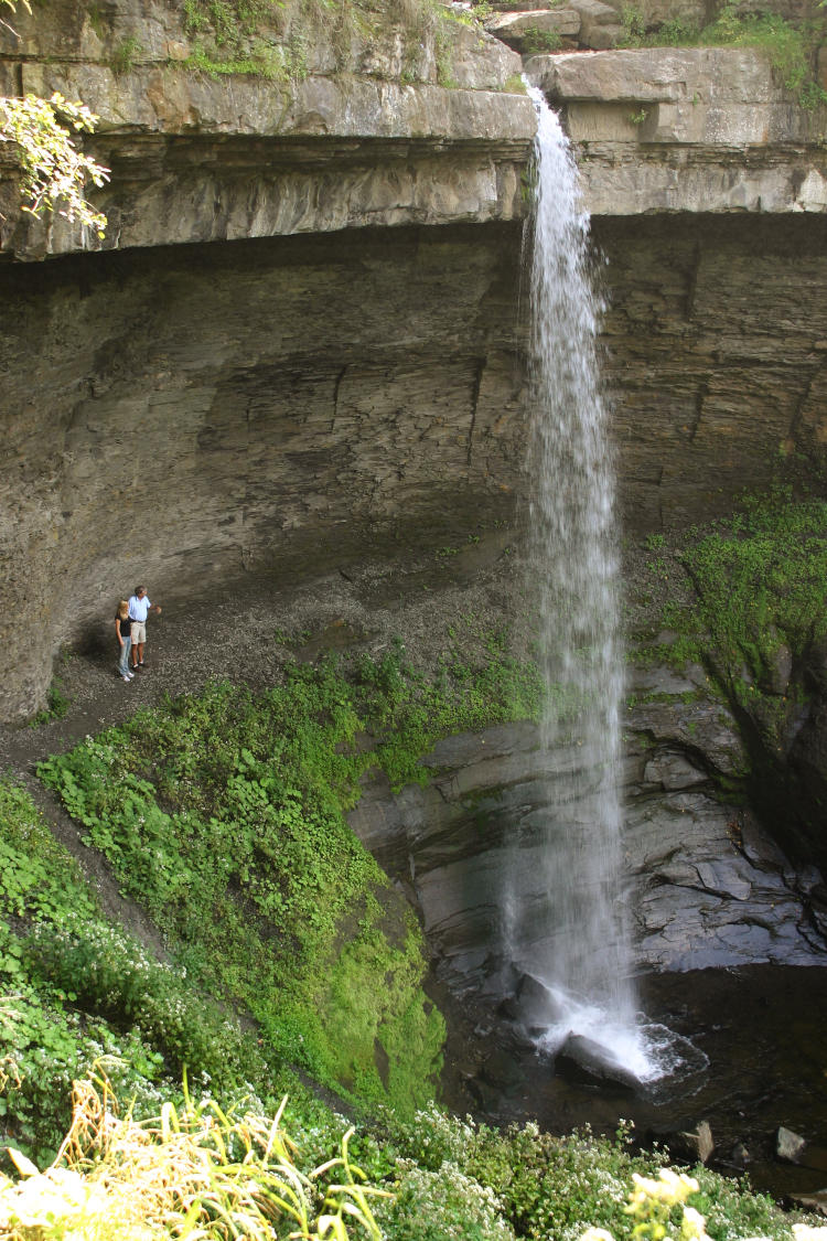 Carpenters Falls on Skaneateles Lake, NY, with people for scale