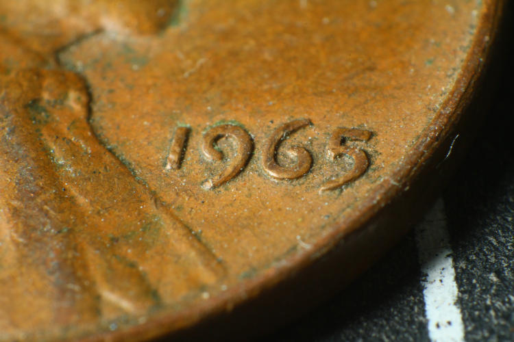 penny/cent at minimum focusing distance for reversed Sigma 28-105 f2.8-4