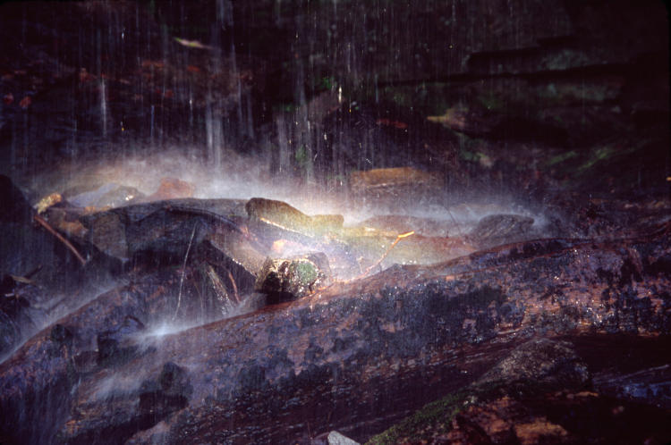 mountain runoff splashing on rocks