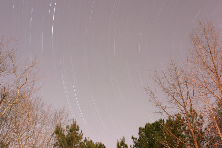 one-hour time exposure of star trails with too much background light