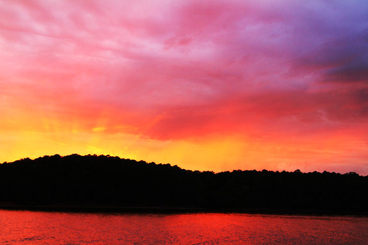 sunset colors with crepuscular rays