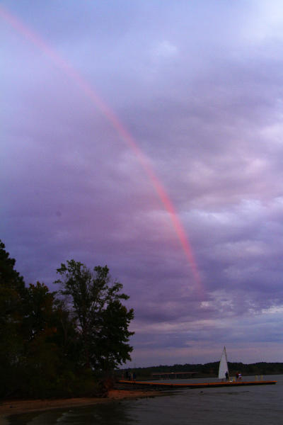 rainbow over Jordan Lake and sailboat