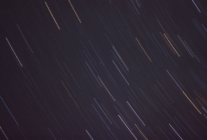 multiple exposure of starfield showing rotation