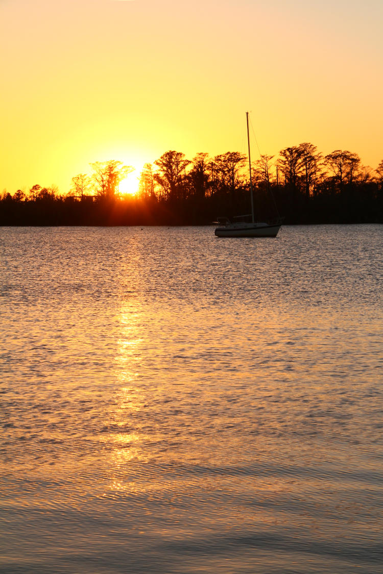 sunset with sailboat on Pamlico River
