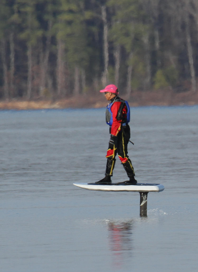 surfer on hydrofoil board on Jordan Lake