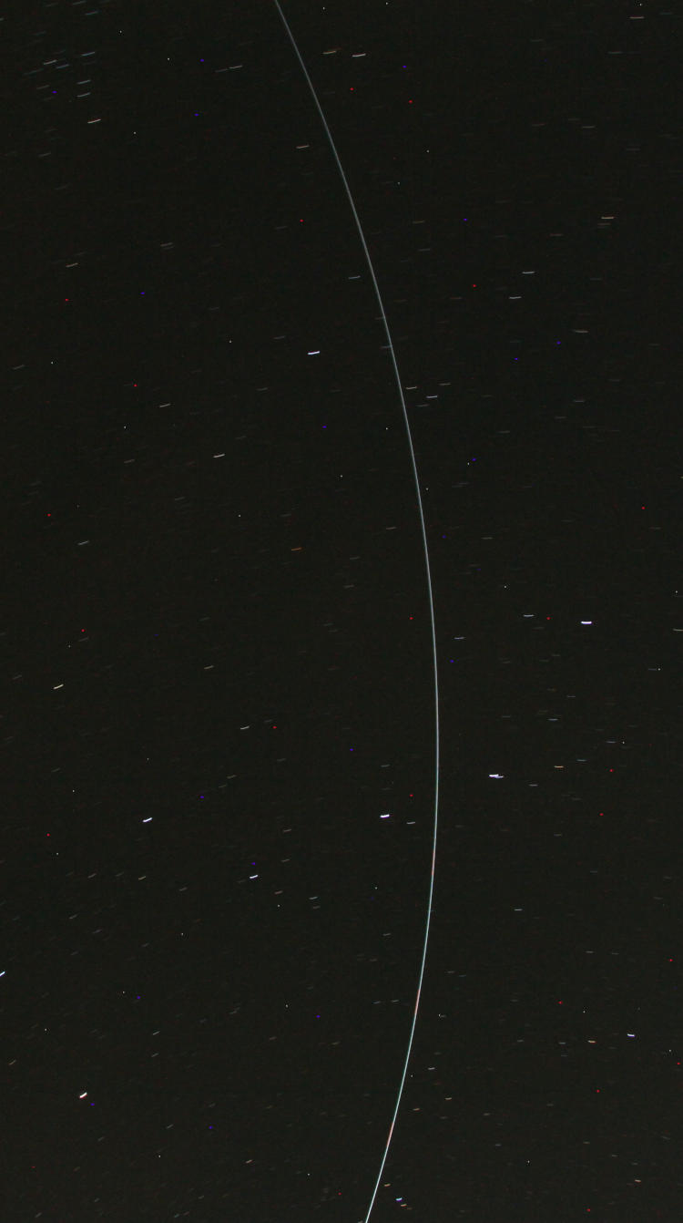 helicopter passing through long time exposure trying to capture meteors