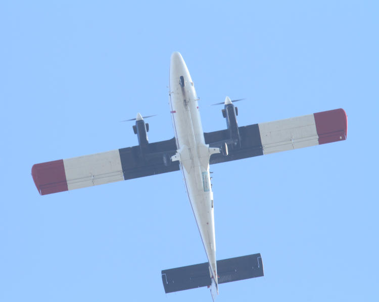 de Havilland Canada DHC-6 Twin Otter of All Veteran Group passing overhead at Skyfest NC, Johnston Regional Airport