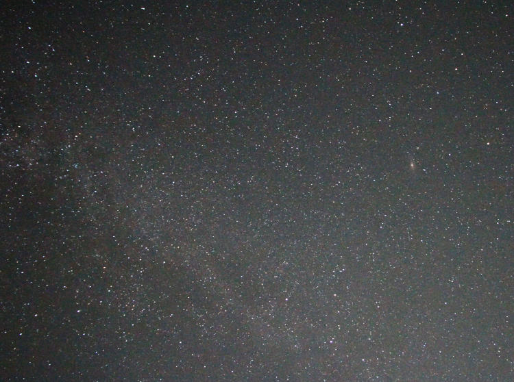 very cluttered night exposure showing Andromeda galaxy