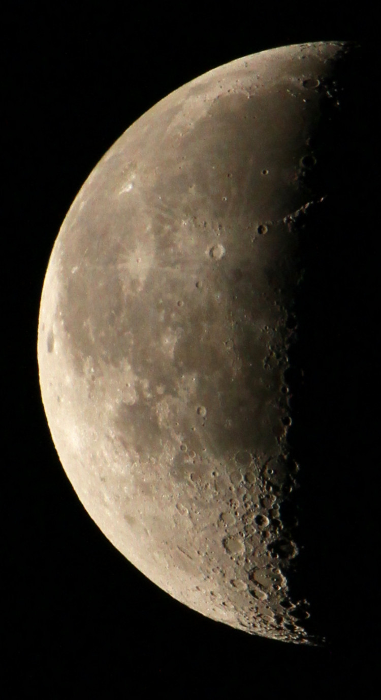 full resolution crop of waning crescent moon showing sunset and shadow on Tycho's central peak