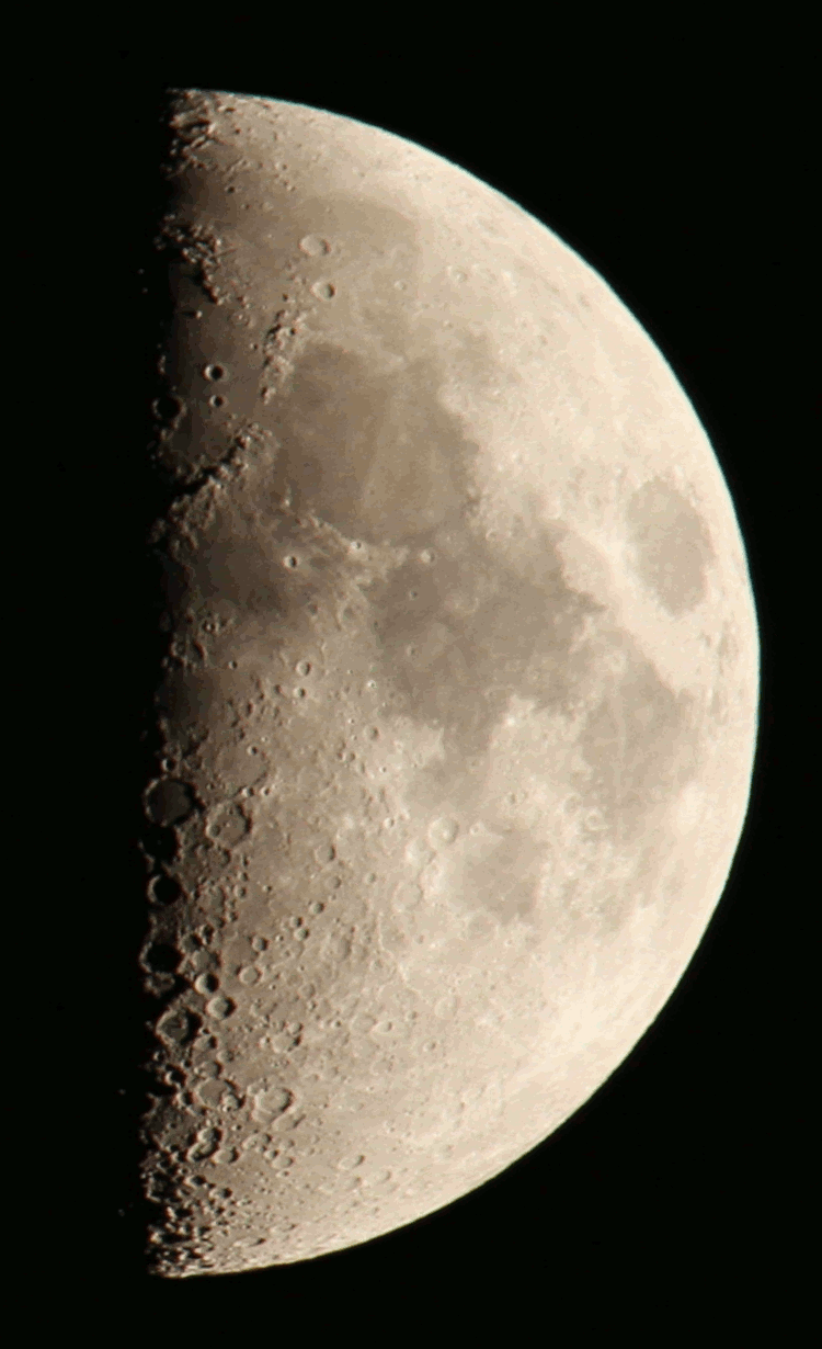 two-frame animation of first quarter moon roughly 150 minutes apart