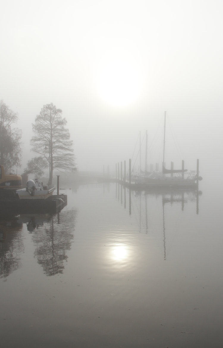 sun glowing through heavy fog on Pamlico Sound