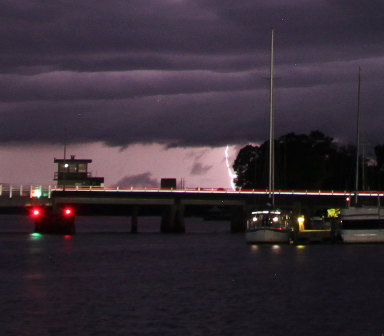 cropped inset of previous photo to show lightning bolt peeking under cloud deck