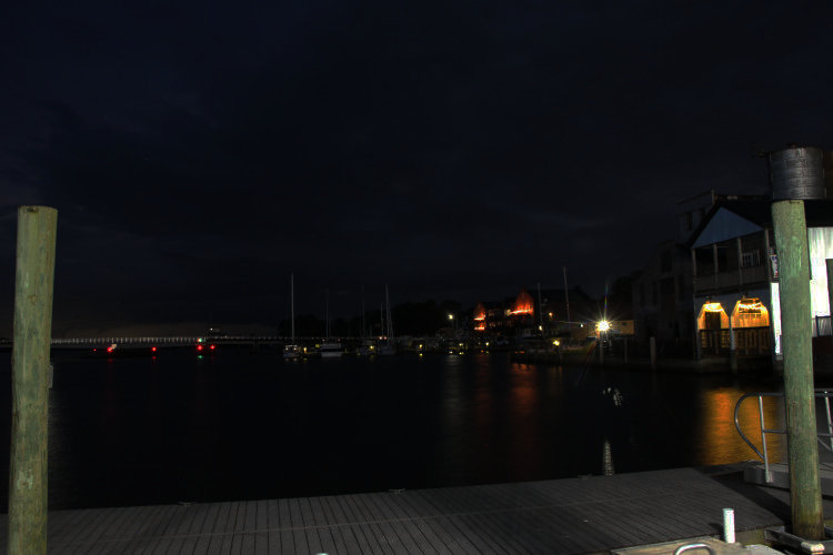 time exposure out along waterfront between lightning strikes