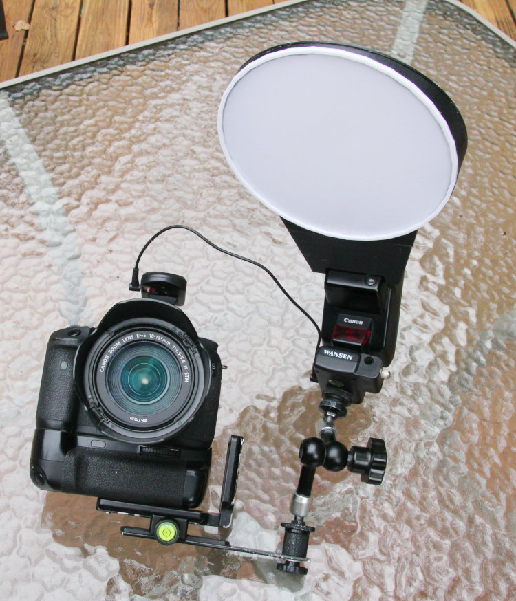 front view of new macro softbox design showing adjustable arm on flash