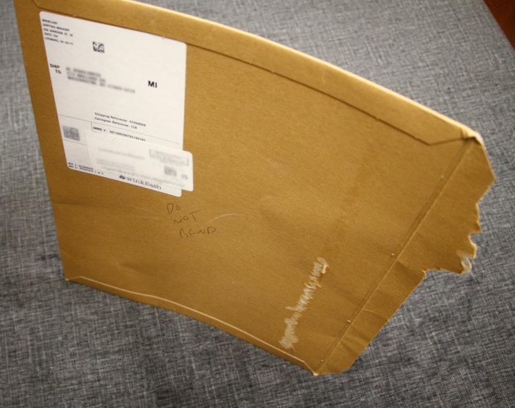 inadequate and bendable packaging from winkflash showing kinks from bending