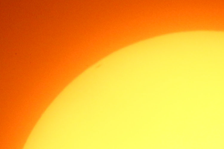 full resolution inset of portion of sun's face from February 25, 2025, showing first hint of returning sunspot on edge of limb