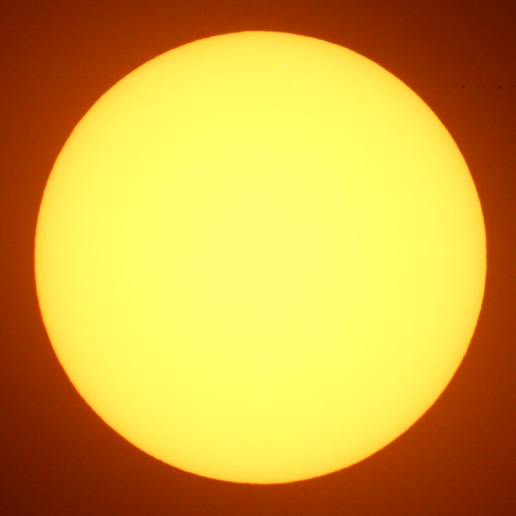 sun face through solar filter showing no visible sunspots on Feb 23, 2026
