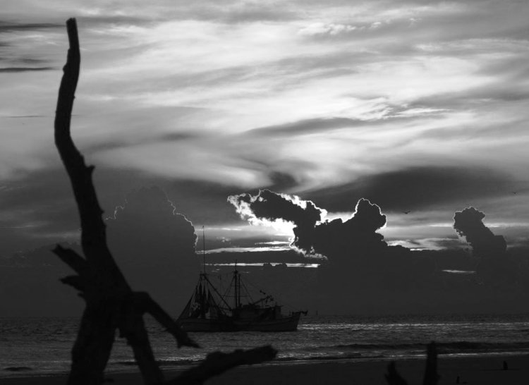 fishing boat at sunrise off Jekyll Island, GA, in contrast increased Green channel