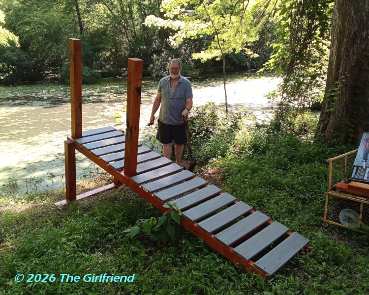 The author alongside kayak dock before it was placed in pond, photo by The Girlfriend
