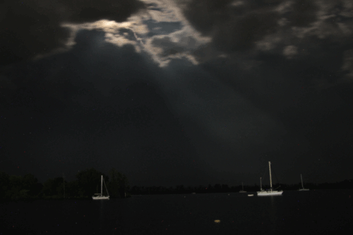 animated gif of nine frames showing cloud movement and moonbeam tracking across Pamlico River