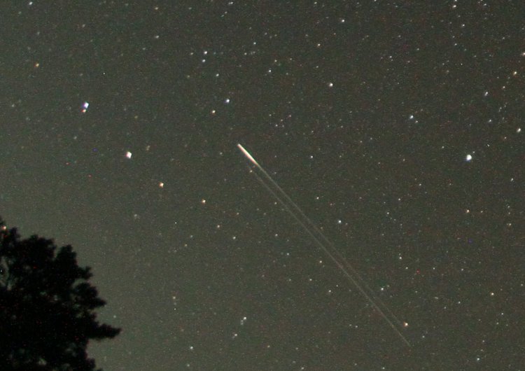 continued tracks during long night exposure, revealing parallel satellites