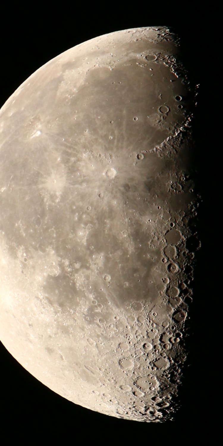 full resolution crop of waning gibbous moon showing detail along the terminator and further