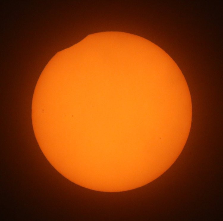 peak minimal partial solar eclipse from North Carolina, August 12 2026, through a solar filter