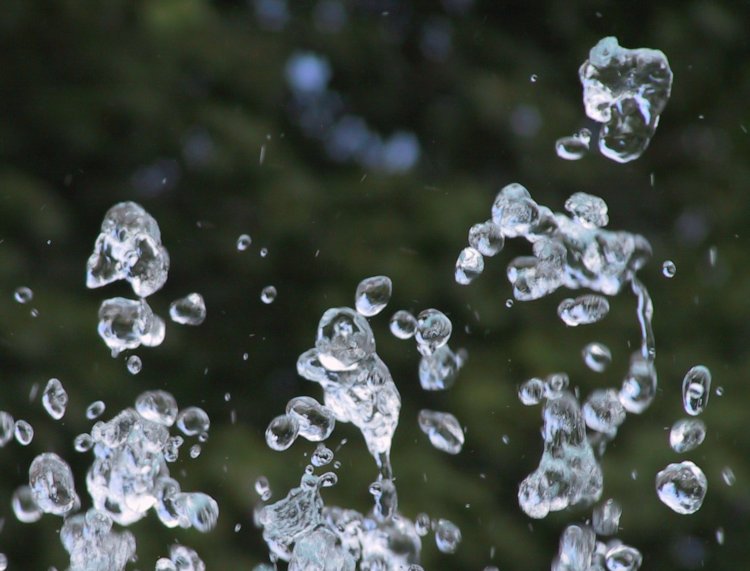 water drops from fountain captured in midair