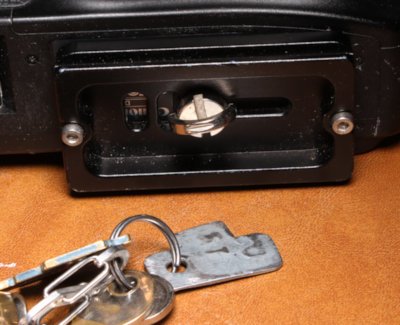 Arca-Swiss style quick-release plate and screwdriver on keyring
